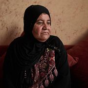 Afaf Abu Alia, 55, attackerades av bosättare när hon skördade oliver i Turmus Ayya.