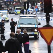 Poliser och avspärrningar vid Medborgarplatsen i Stockholm den 31 augus