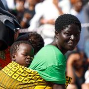 Migranter som väntar på att få resa vidare från Lampedysa till Italien. Bild från 25 september 2023.