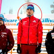 Sergej Ustigov, Jevgenij Belov (mitten) och Dario Cologna på pallen i Gällivare i dag.