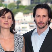 Carrie-Anne Moss och Keanu Reeves.