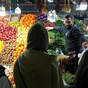 People make purchases at Tajrish traditional bazaar in northern Tehran, Iran, Thursday, Feb. 19, 2026. (AP Photo/Vahid Salemi)  VAH110
