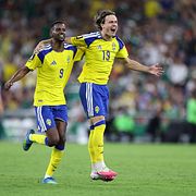Mattias Svanberg  och Alexander Isak firar mot Tunisien under VM förra veckan.