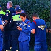 Paramedics gather near a deadly explosion at a restaurant in Moscow, Saturday, Aug. 1, 2026. (Sergei Vedyashkin/Moscow News Agency via AP)  XAZ110
