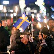 Ytterhögerpartiet Alternativ för Sverige arrangerade ett fackeltåg under söndagen.  