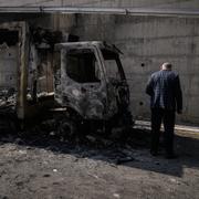 Utbrända fordon efter branddåden på Västbanken, 12 november 2025. 