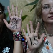 Demonstranter vid COP30.