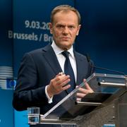 Donald Tusk under en presskonferens i Bryssel efter att han omvalts på torsdagen.