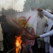 Bild på Indiens premiärminister Narendra Modi bränns i Pakistan, 7 juni. 