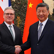 Keir Starmer och Xi Jinping.