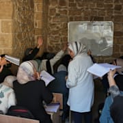 Elever återvänder till klassrummen i Gaza stad i november 2025. 