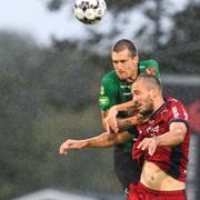 Varbergs Jon Birkfeldt och Djurgårdens Emir Kujovic under fotbollsmatchen i dag. 