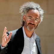 In this 2019 file photo, Palantir CEO Alex Karp arrives for the Tech for Good summit in Paris.