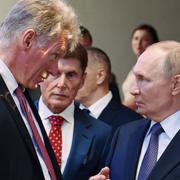 Dmitrij Peskov och Vladimir Putin.