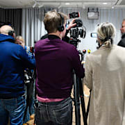 Illustrationsbild på journalister vid en pressträff.