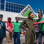  Activists, including Arkadiusz Szczurek, left, take part in a protest outside an outlet of French home improvement retailer Leroy Merlin in Warsaw, Poland, on Saturday May 7, 2022.