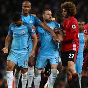 Fellaini och Sergio Agüero.