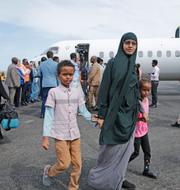 Somaliska studenter som har flytt striderna i Sudan.  Farah Abdi Warsameh / AP