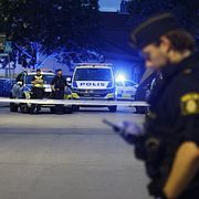 Polis på plats i Uppsala efter dödsskjutningen.