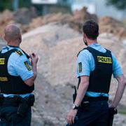 Polis på brottsplatsen. 