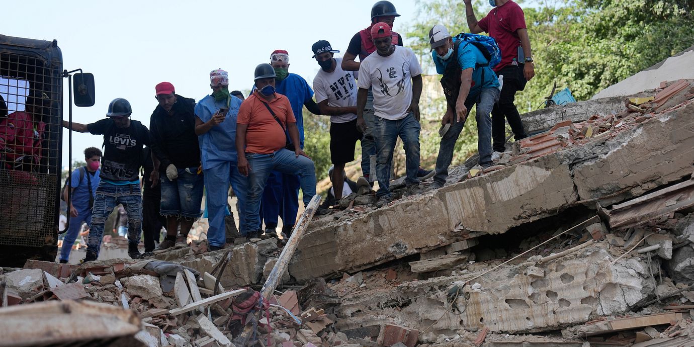 Boende vid rasmassor i Catia La Mar i Venezuela.
