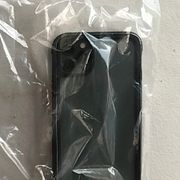 En telefon som tagits i beslag i samband med en utredning om sexuella övergrepp.