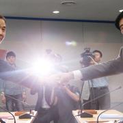 Sydkoreas och Nordkoreas representanter vid mötet.
