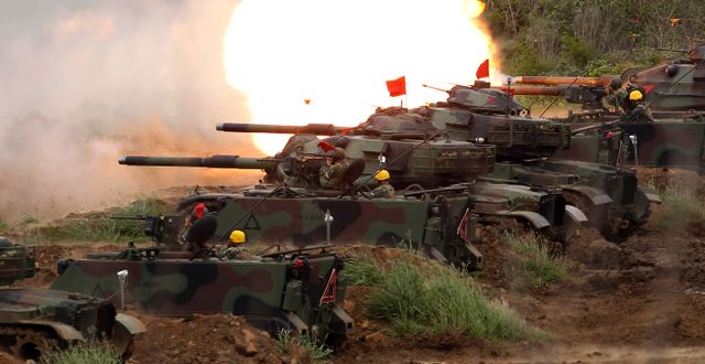 Amerikanska Patton-pansarvagnar. Chiang Ying-ying/AP