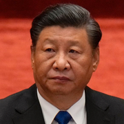 Kinesisk räddningspersonal och Xi Jinping. 