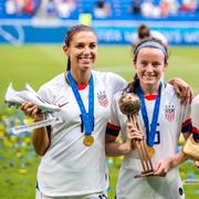 Alex Morgan, Rose Lavelle och Megan Rapinoe firar VM-guldet 2019. 