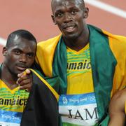 Asafa Powell, Nesta Carter, Usain Bolt och Michael Frater vid OS i Peking 2008.