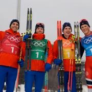 Det norska laget med Didrik Tønseth, Martin Johnsrud Sundby, Simen Hegstad Krüger och Johannes Høsflot Klæbo jublar efter guldet.