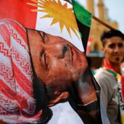 President Massoud Barzani på en flagga i samband med den kurdiska folkomröstningen i Irak. 