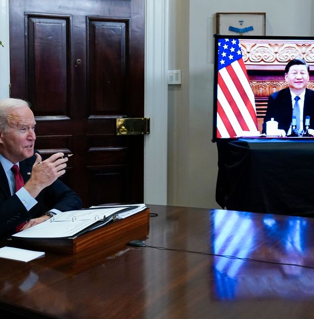 President Joe Biden meets virtually with Chinese President Xi Jinping. Susan Walsh / AP