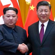 Kim Jong-Un och Xi Jinping. 