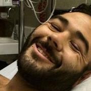 Chris Mintz på sjukhus efter massakern.