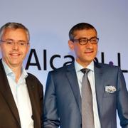 Michel Combes, vd på Alcatel-Lucent, och Nokias vd Rajeev Suri.