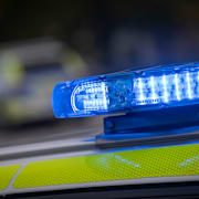 Den anställde greps och anhölls under natten mot tisdag.