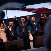 Turkish President and People's Alliance's presidential candidate Recep Tayyip Erdogan, centre, gestures to supporters during an election rally campaign in Istanbul, Turkey, Friday, April 21, 2023. 