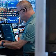 A trader works on the floor of the New York Stock Exchange in New York, Friday, Aug. 21, 2026. (AP Photo/Yuki Iwamura)  NYYI101