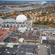 Flygbild över Globen, Globen city och Slakthusområdet i Stockholm. Arkivbild.