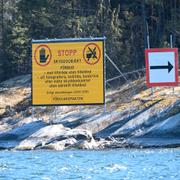 En varningsskylt  i Stockholms skärgård nära Musköbasen.