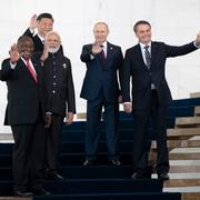 From left to right, South Africa's President Cyril Ramaphosa, China's President Xi Jinping, India's Prime Minister Narendra Modi, Russia's President Vladimir Putin and Brazil's President Jair Bolsonaro pose for a photo at the BRICS emerging economies at the Itamaraty palace in Brasilia, Brazil, Thursday, Nov. 14, 2019.