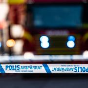 Polisavspärrning och brandbil. Arkivbild.