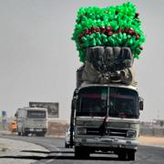Arkivbild: En överlastad buss efter en bussolycka i Kandahar 2011