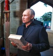 Putin under moskébesöket. Gavriil Grigorov / AP