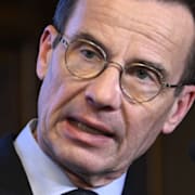 Ulf Kristersson/Nato-soldater under övning.