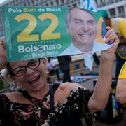 Bolsonarosupportrar under ett kampanjevent i Brasilia den 27 oktober 2022. 