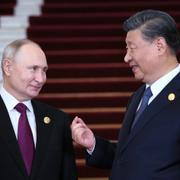 Vladimir Putin och Xi Jinping i Peking på tisdagen.