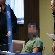 En man i 45-årsåldern häktas misstänkt för flyktingspioneri.